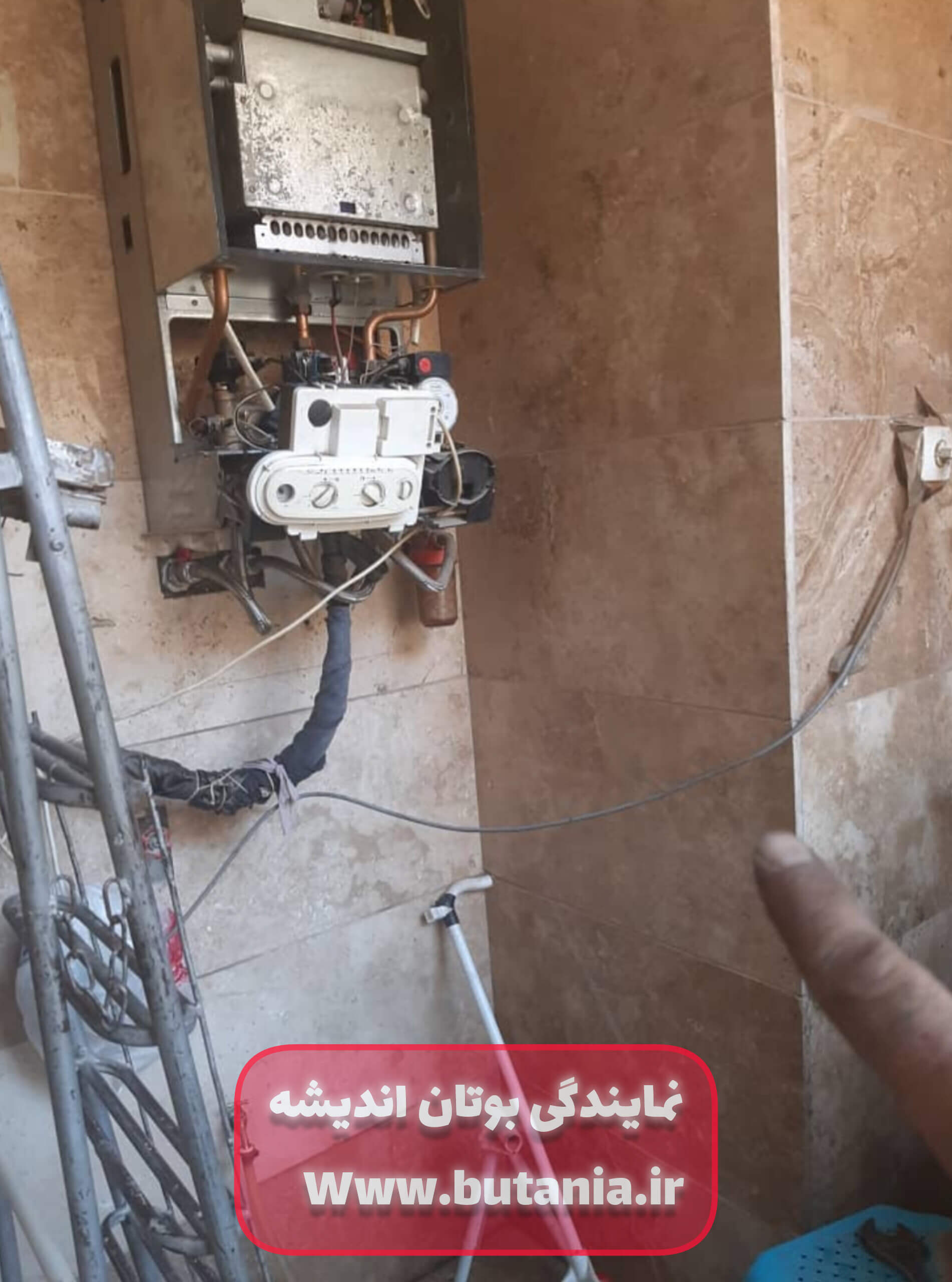 عکس تعمیرات پکیج بوتان توسط تعمیرکار نمایندگی بوتان